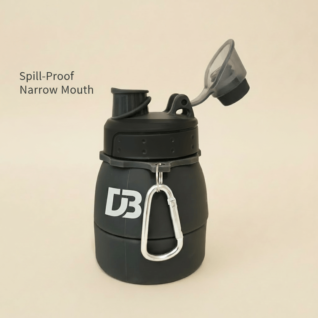 Black spill-proof water bottle with carabiner on a beige background